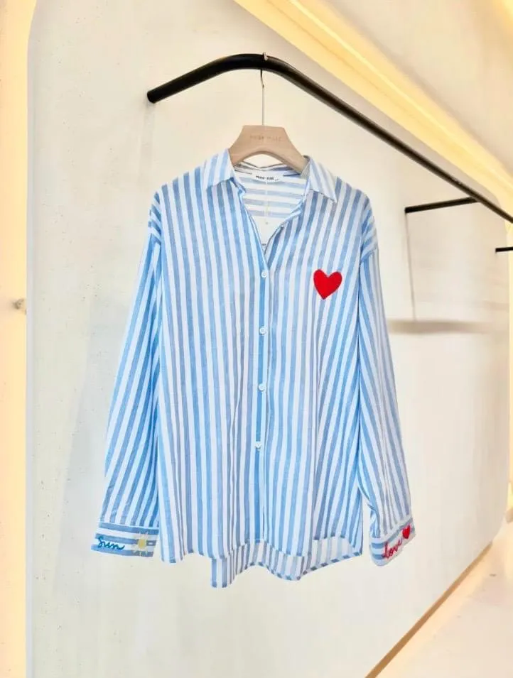 Blusa con bordado sol